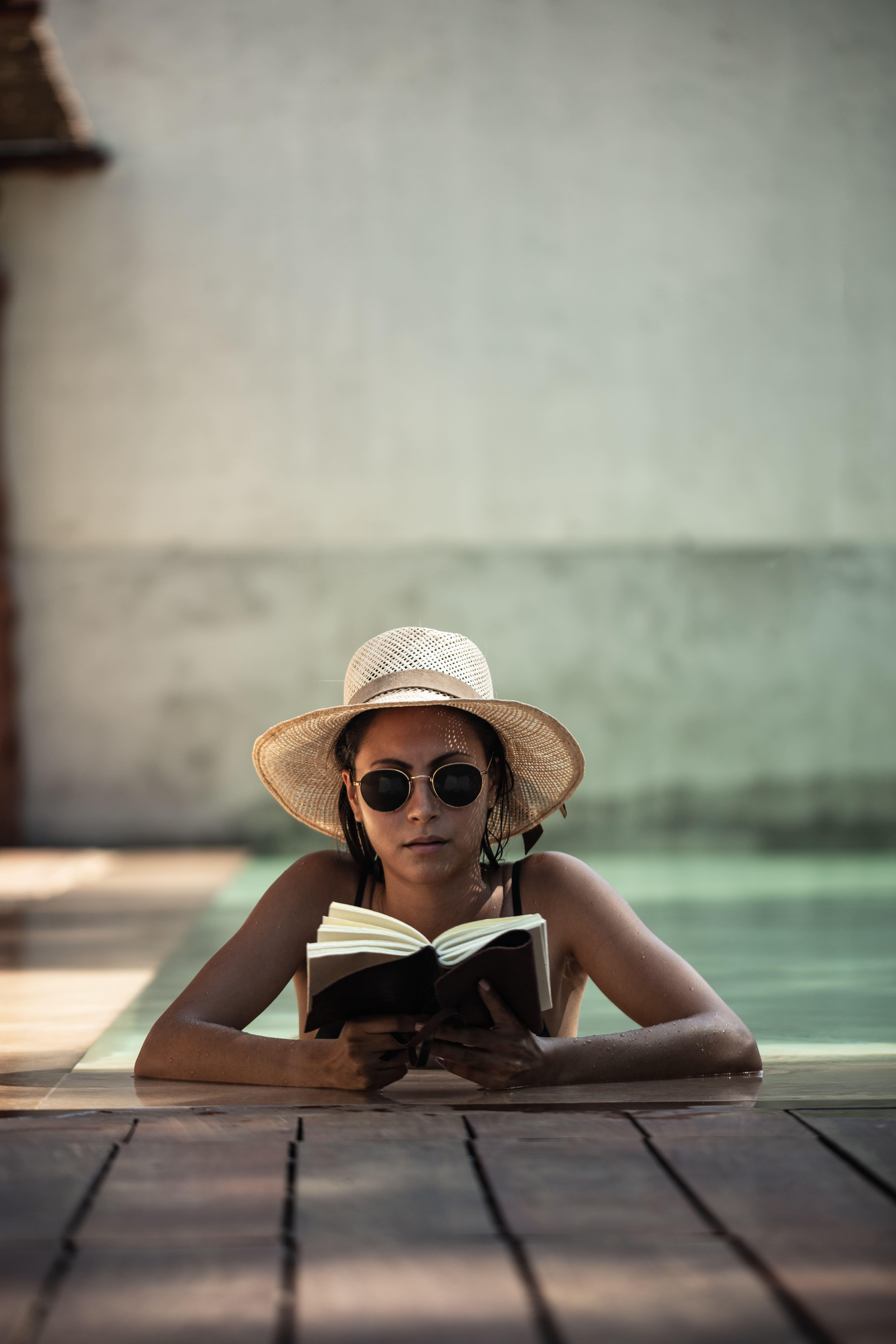 Oku Ibiza (Adults Only) Hotel San Antonio  Exterior photo A woman wearing a hat