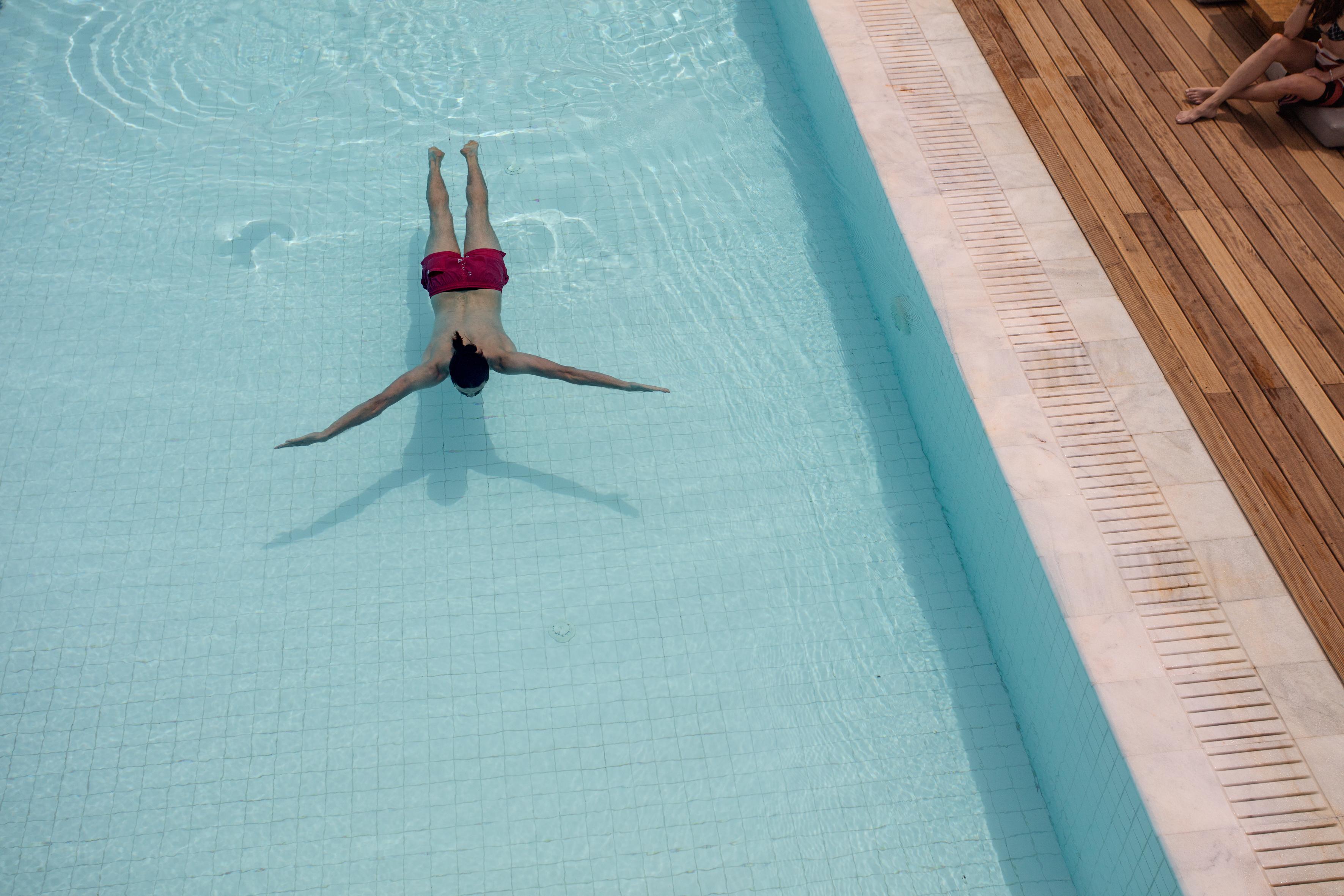 Oku Ibiza (Adults Only) Hotel San Antonio  Exterior photo A man floating in a swimming pool